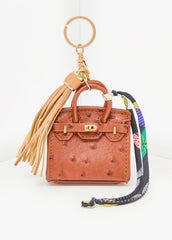 Ostrich Effect Tasseled Bag Charm Brown | Ashley Stewart