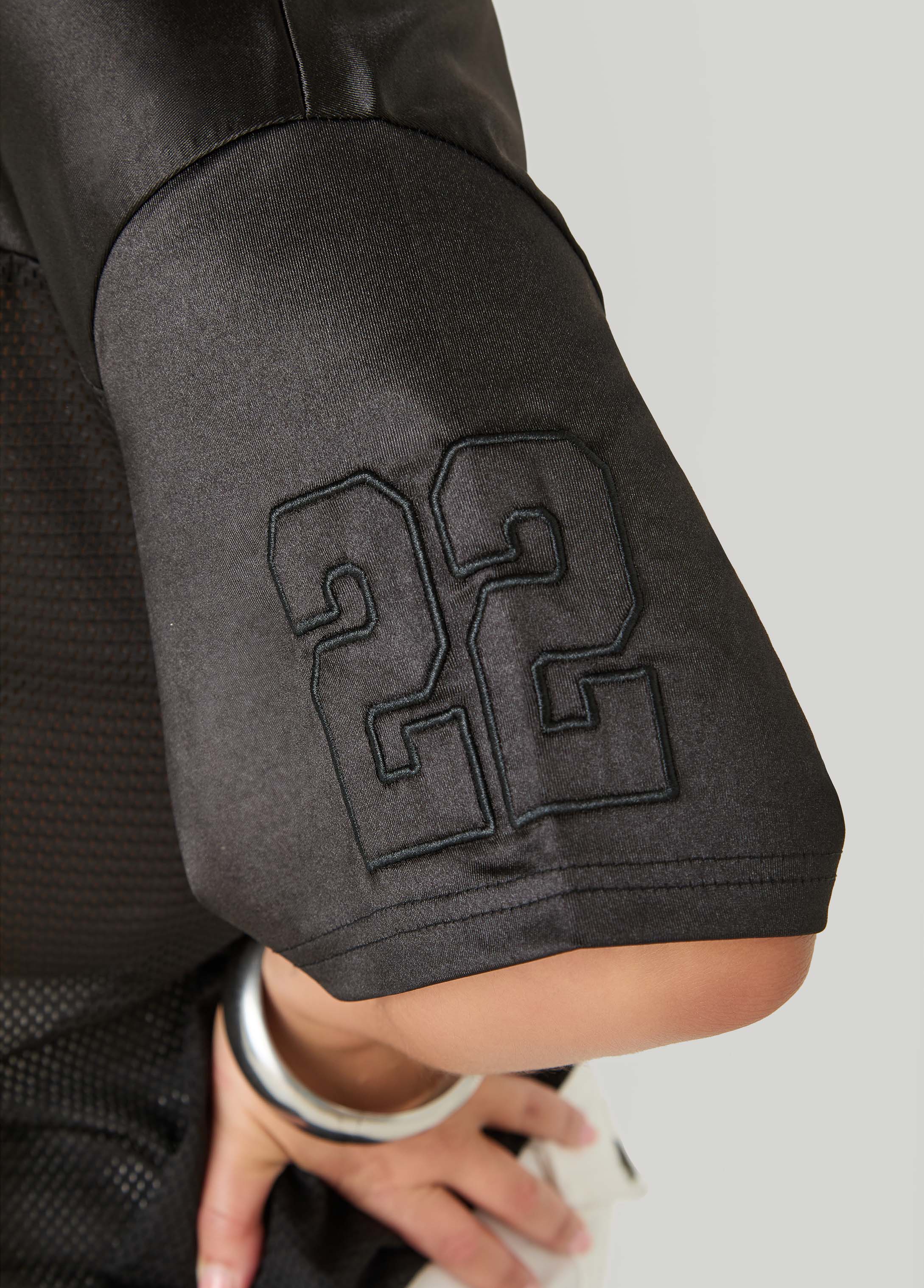 Mesh Paneled Jersey Black | Ashley Stewart