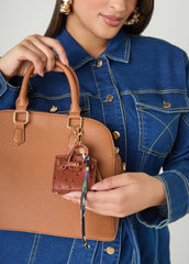Ostrich Effect Tasseled Bag Charm Brown | Ashley Stewart
